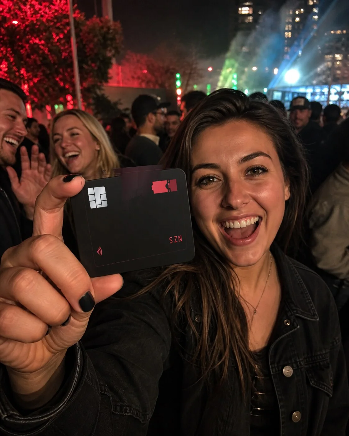 The SZN card held up at a night event